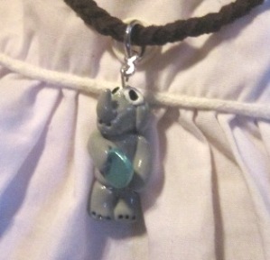 Rhino Charm w/Metalic Teal Disc